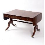 A Regency mahogany sofa table, two drawers to each side, on end supports with outswept legs,