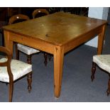 A rectangular pine kitchen table fitted a single drawer,