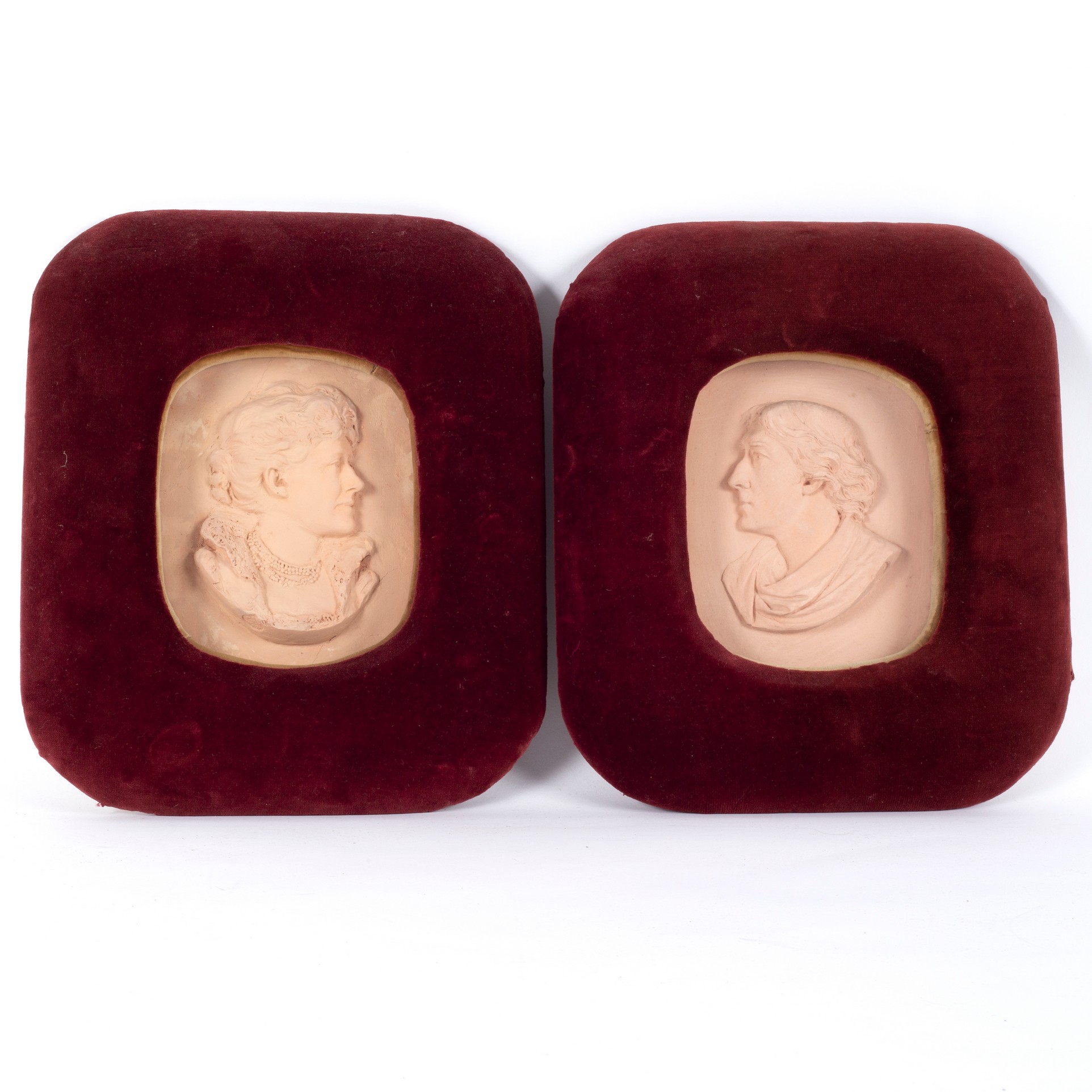 A pair of painted plaster portrait reliefs, of Ellen Terry and Henry Irvine, 15cm x 12.