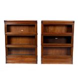 A pair of Globe Wernicke type three-section oak bookcases,