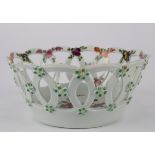 A Worcester small circular basket with overlapping circlet sides painted flower sprays, circa 1760,