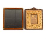 A small rectangular wall mirror in a burr yew frame with brass roundels to the corners, 26.