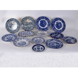 Thirteen Staffordshire blue and white willow pattern plates and four others