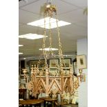 A gothic revival gilt metal nonagonal chandelier, fitted for electricity, 45cm wide,