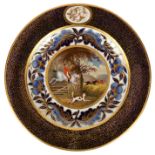 A Derby plate, circa 1815, decorated a hunting scene by William Cotton,