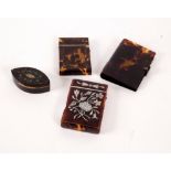 A 19th Century pressed tortoiseshell visiting card case, decorated a Gothic arch, 9cm high,