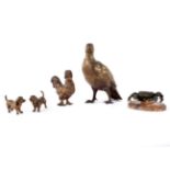 An Austrian gilt bronze figure of a grouse in the manner of Franz Bergmann, 16cm high,