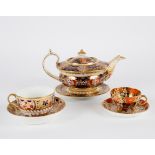 A Spode Imari pattern breakfast cup and saucer and a Davenport teacup and saucer similar,
