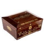 A George IV rosewood and brass inlaid box of sarcophagus form,