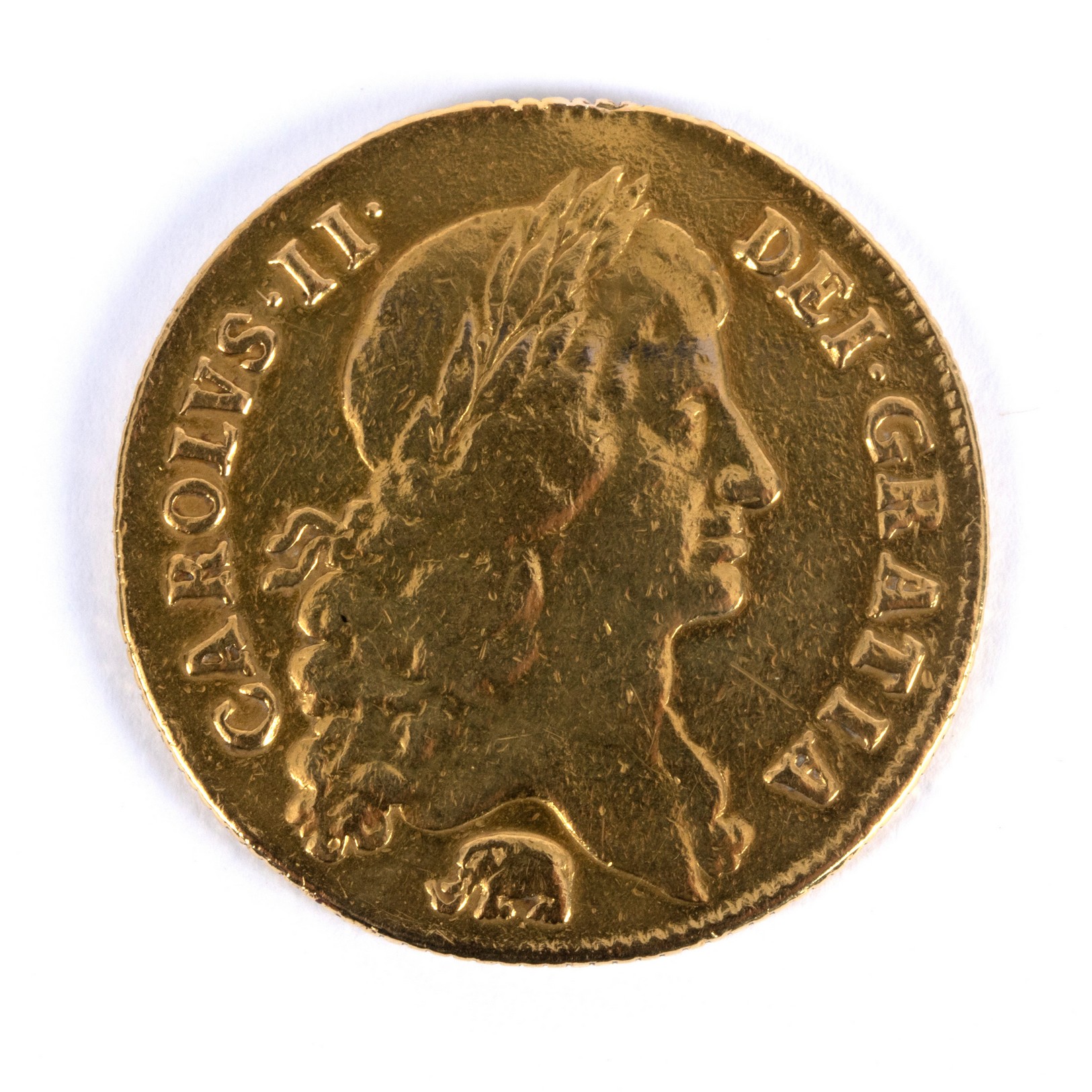 A Charles II gold two guinea coin, 1664, bust with elephant below/see ...