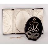 Naval Interest: A presentation plaque with easel back applied with an anchor above a scroll