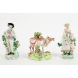 A pair of Derby figures of a Shepherd and Shepherdess and a cow and bocage model, circa 1770,