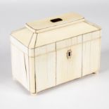 A Regency ivory tea caddy of sarcophagus form, fitted two lidded compartments (splits), 15.