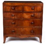 A Victorian mahogany chest of three long and two short drawers, on splay feet,