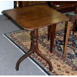 A 19th Century mahogany tilt top occasional table, on turned support with stiff leaf base,