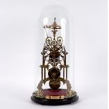 A 19th Century brass skeleton clock in a Gothic style case,