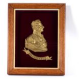 A 19th Century gilt brass relief bust of the Duke of Wellington, mounted,