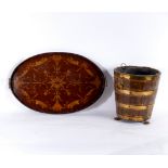 An Edwardian mahogany and inlaid tray, of oval twin handled form,