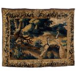 A late 17th/early 18th Century Flemish Verdure Tapestry depicting two peacocks in a woodland glade,