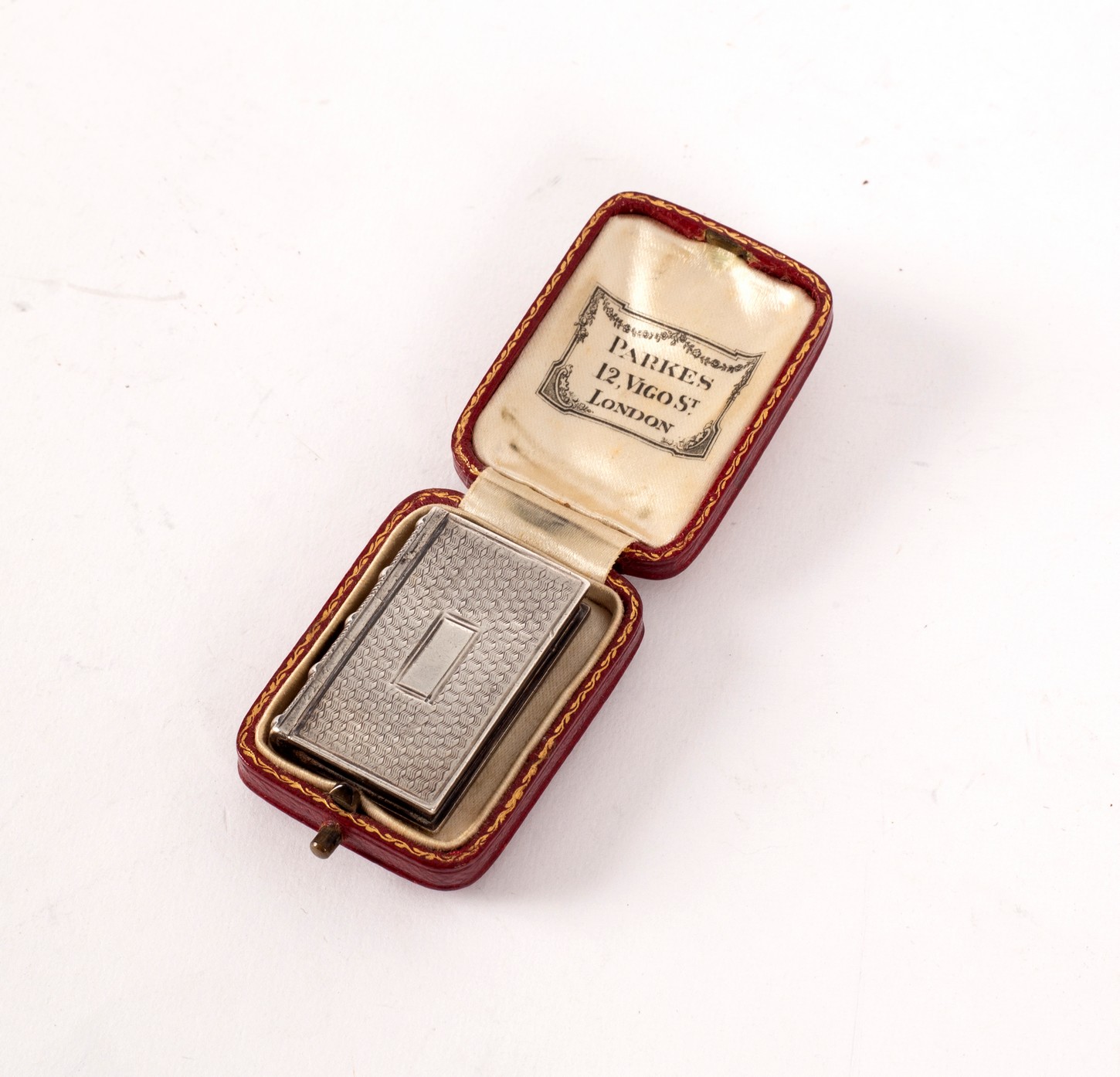 A William IV book form silver vinaigrette, T & P, Birmingham 1832, with pierced gilt grille,