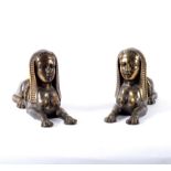 A pair of cast bronze figures of Sphinx,