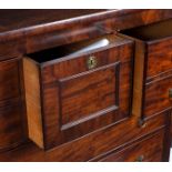 A Regency mahogany chest of four short drawers above three long drawers,