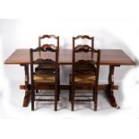 A reproduction refectory table and four ladderback chairs, 195cm x 95.