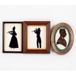 A 19th Century silhouette of a violinist,