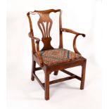 An 18th Century splat back chair on square legs