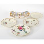 Two Worcester fluted circular plates, circa 1765-70, decorated with loose bouquets of flowers,