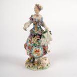 A Chelsea figure of a shepherdess (red anchor), circa 1755-60,