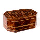 A finely inlaid box, of canted rectangular shape fitted two lift-out trays,