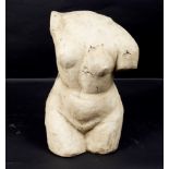 A plaster bust of a nude female torso, 43.