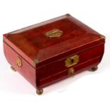 A Regency red leather jewel box of sarcophagus shape,