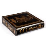 A Chinese export lacquer writing box, the hinged cover decorated figures flanking a scroll,