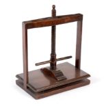 A small 19th Century mahogany napkin press, 30.