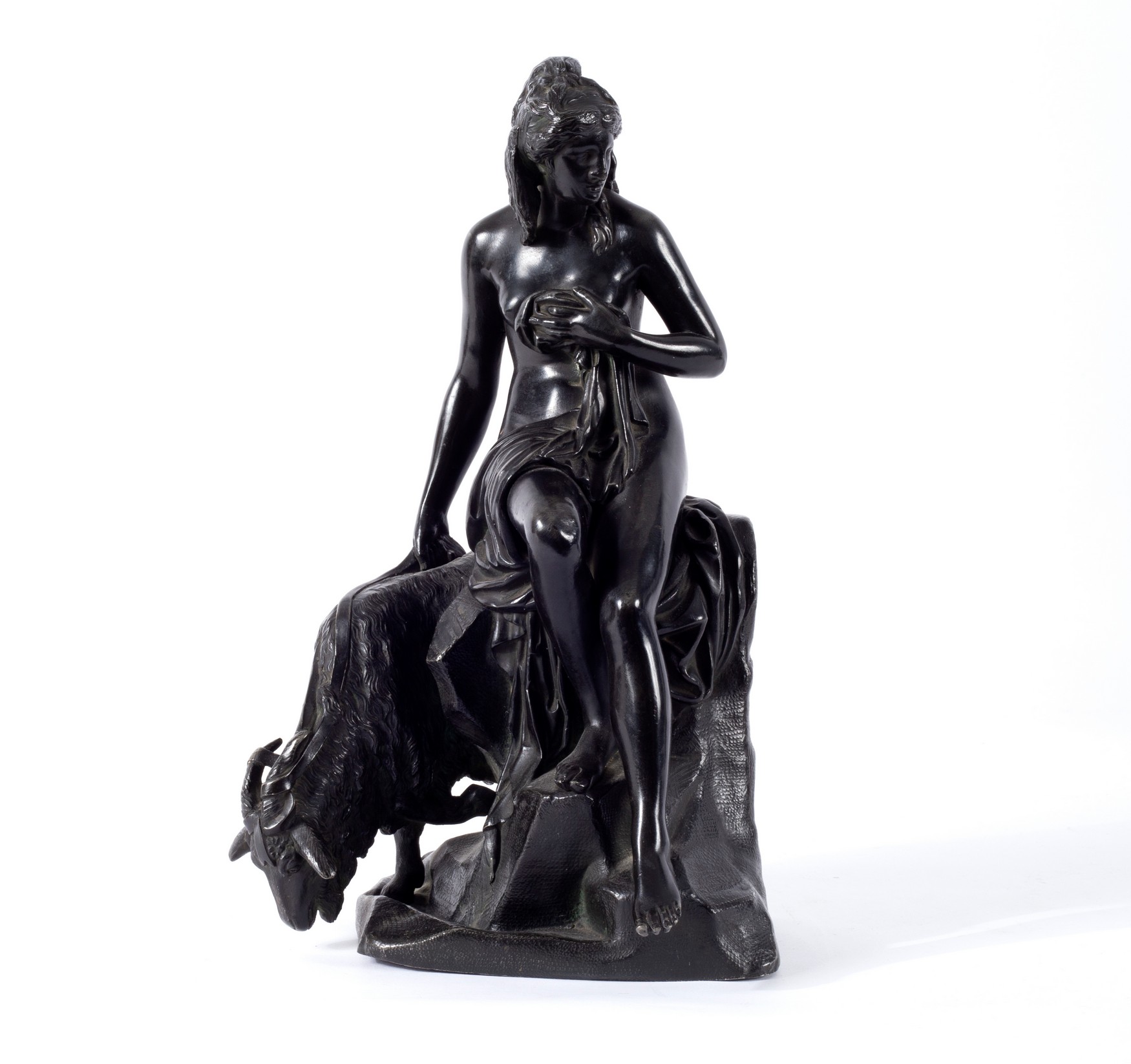 A patinated figure of a girl with a goat,