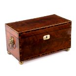 A Regency mahogany and crossbanded tea caddy,