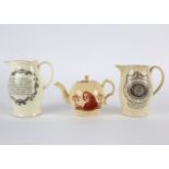 Two English creamware transfer printed jugs and a bullet-shaped teapot and cover,