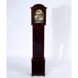 A German grandmother clock, the case with arched hood,