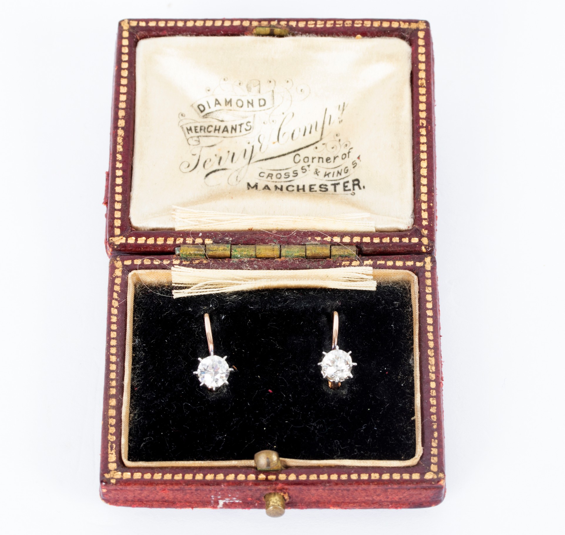 A pair of diamond earrings,