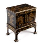 A 19th Century lacquered collector's cabinet, with chinoiserie decoration throughout,