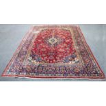 A Kashan rug,