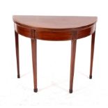 A George III mahogany and satinwood crossbanded card table,