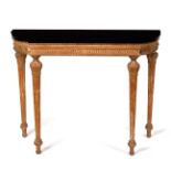 An 18th Century style console table with fluted frieze, on acanthus capped fluted taper legs,