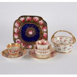 A Spode blue ground square stand painted with pink roses and enriched in gilding, red marks,