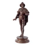 A spelter figure of a musician,