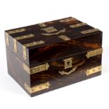 A Victorian coromandel and brass bound tea caddy, the cover with vacant shield cartouche,