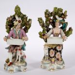 A pair of Chelsea Derby porcelain figures of gallant and companion seated holding baskets,