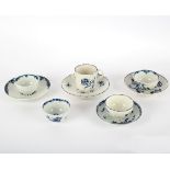 Three Worcester blue and white tea bowls and saucers and a trio, circa 1758-65,